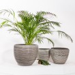 Vaso tondo in ceramica lucido con linee in rilievo orizzontali