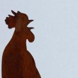 Gallo in metallo arrugginito